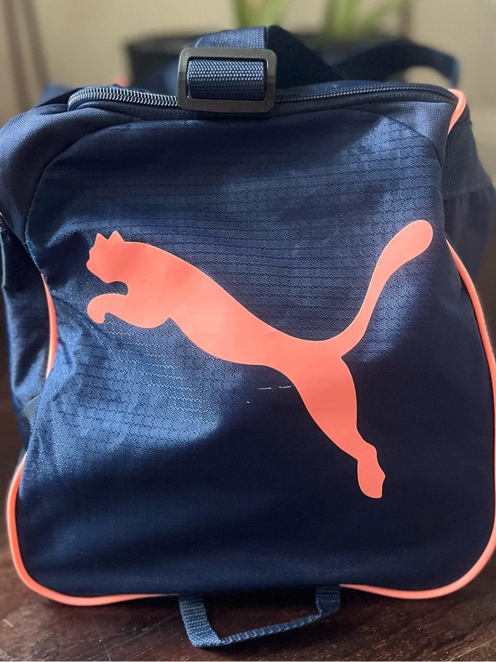 Puma Navy Duffel Bag with Coral Logo Accents